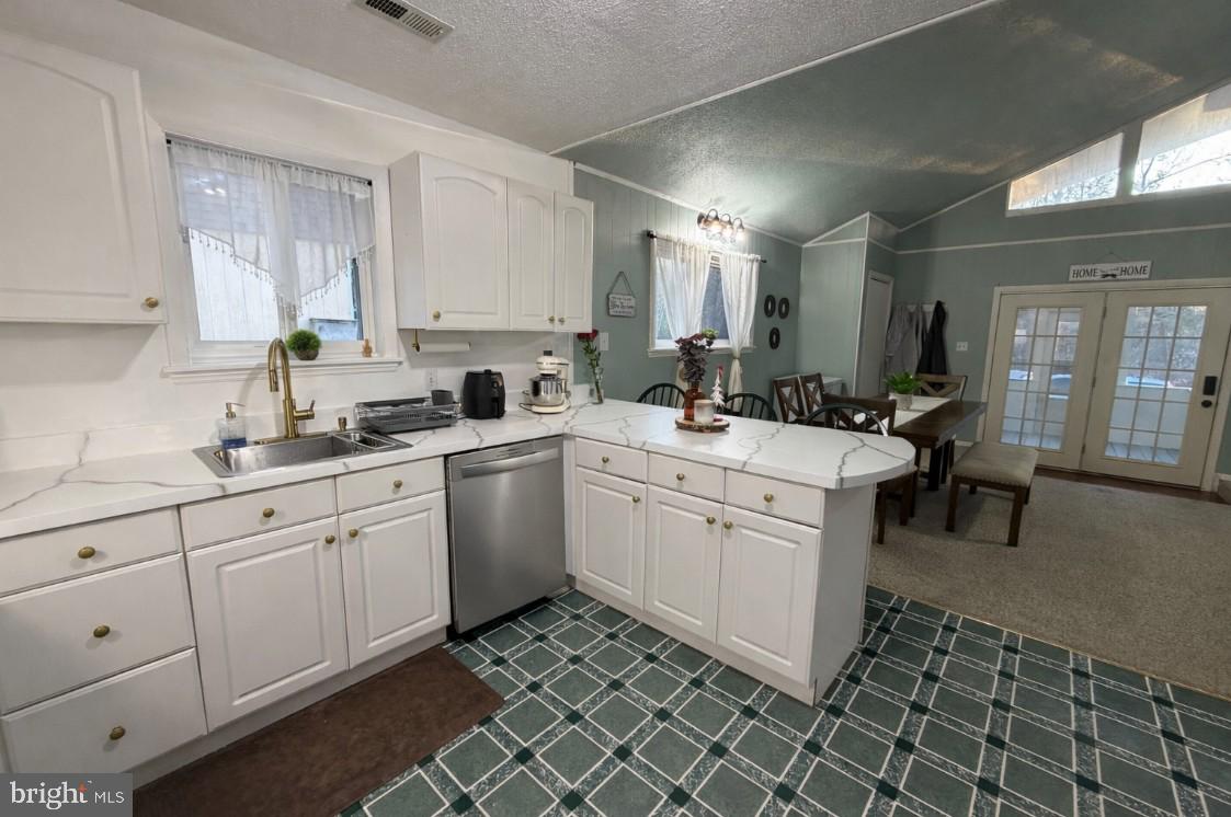 359 Straton Way Basye, VA 22842 - Photo 18 of 38 a kitchen with a sink window and cabinets