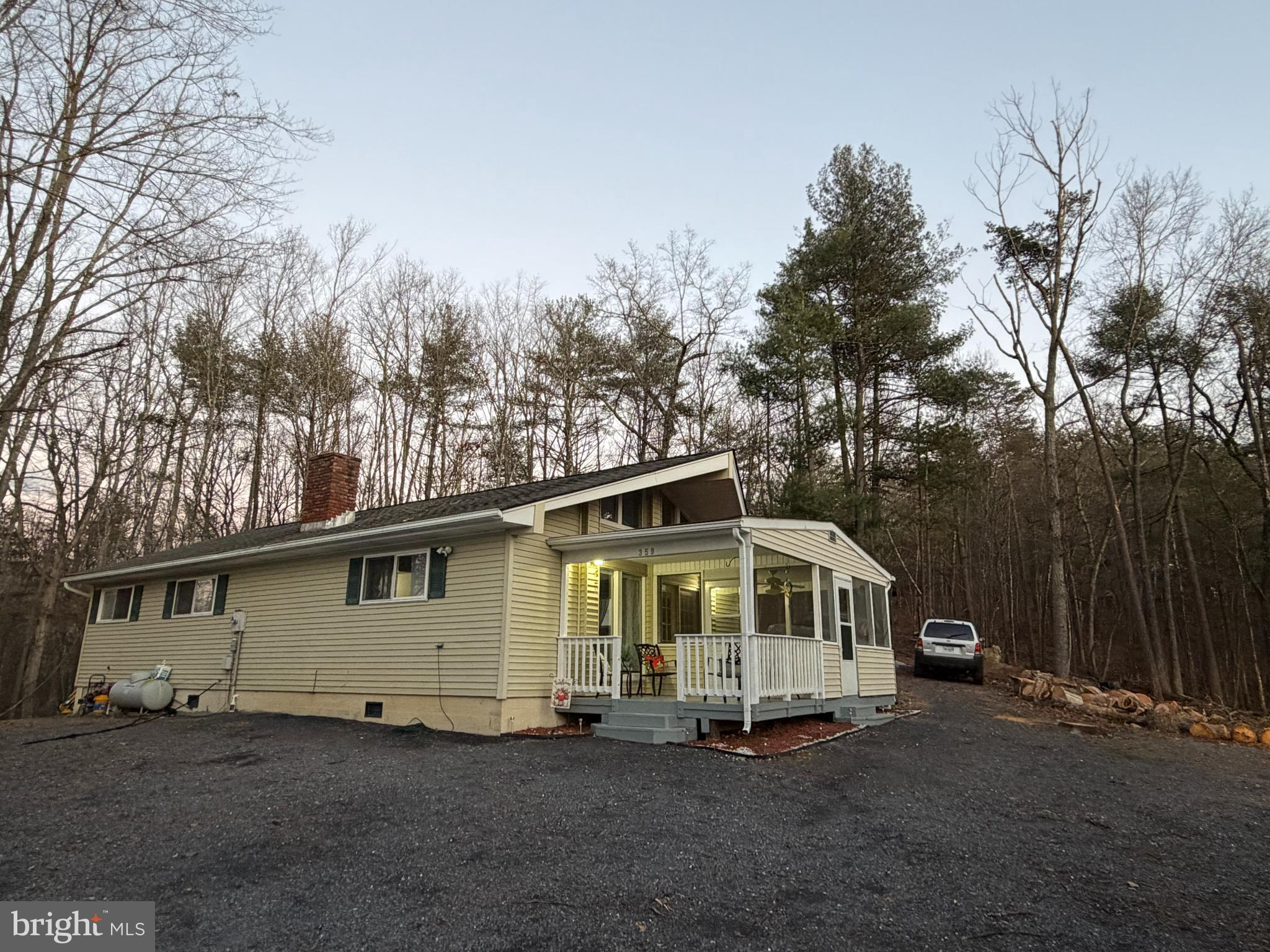 359 Straton Way Basye, VA 22842 - Photo 2 of 38 a view of a house with a yard