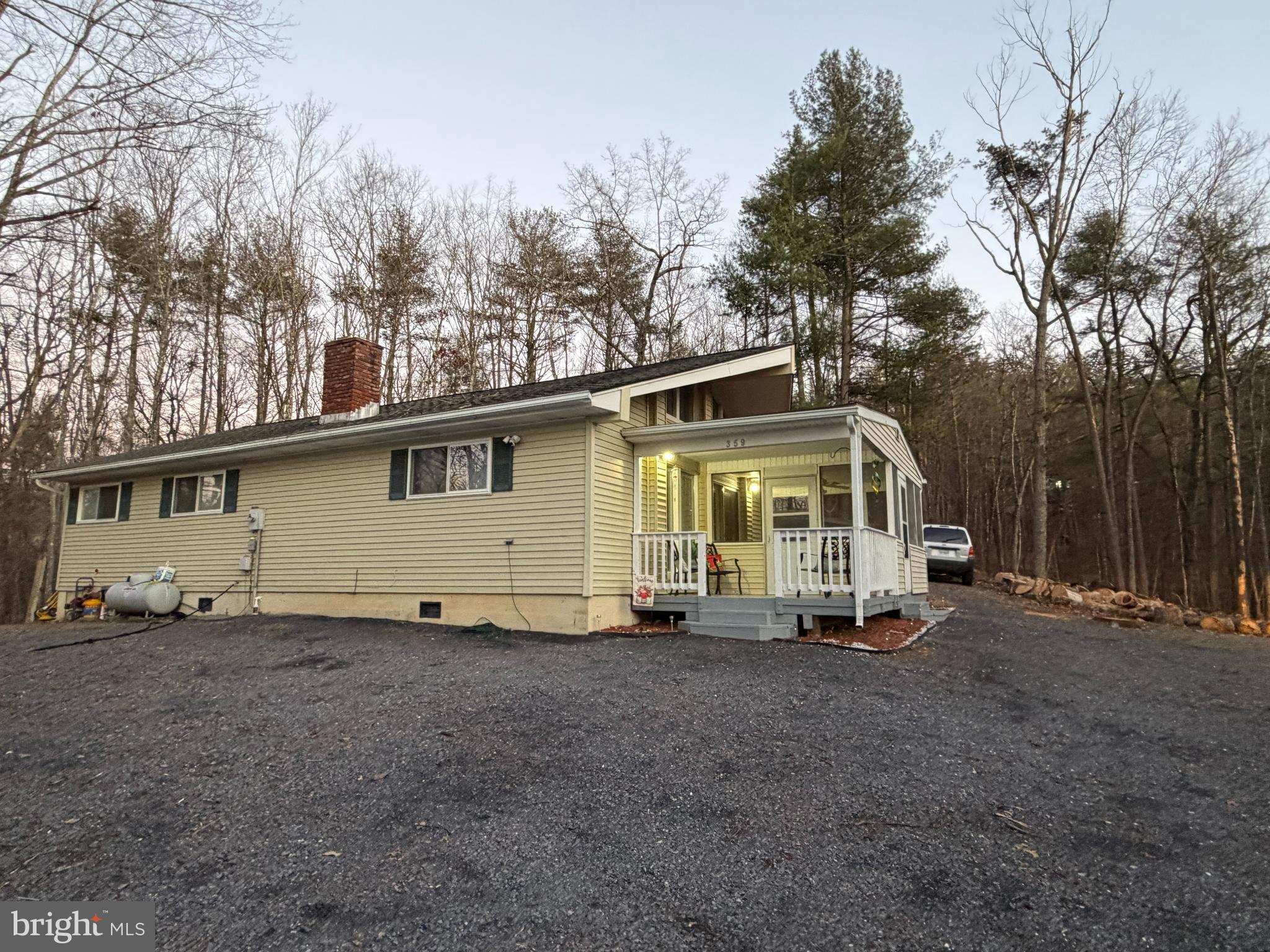 359 Straton Way Basye, VA 22842 - Photo 3 of 38 a view of a house with backyard