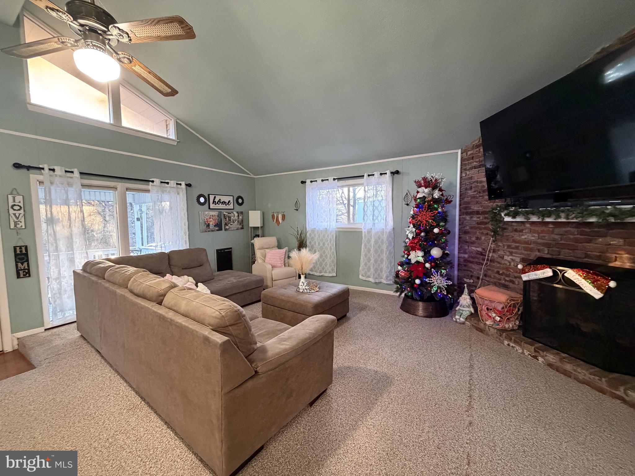 359 Straton Way Basye, VA 22842 - Photo 9 of 38 a living room with furniture and a flat screen tv