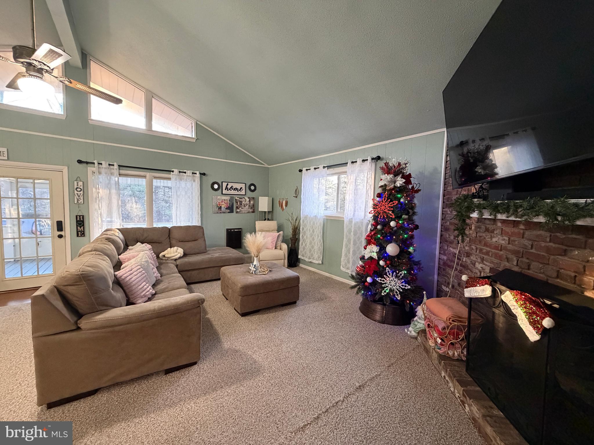 359 Straton Way Basye, VA 22842 - Photo 10 of 38 a living room with furniture and a large window