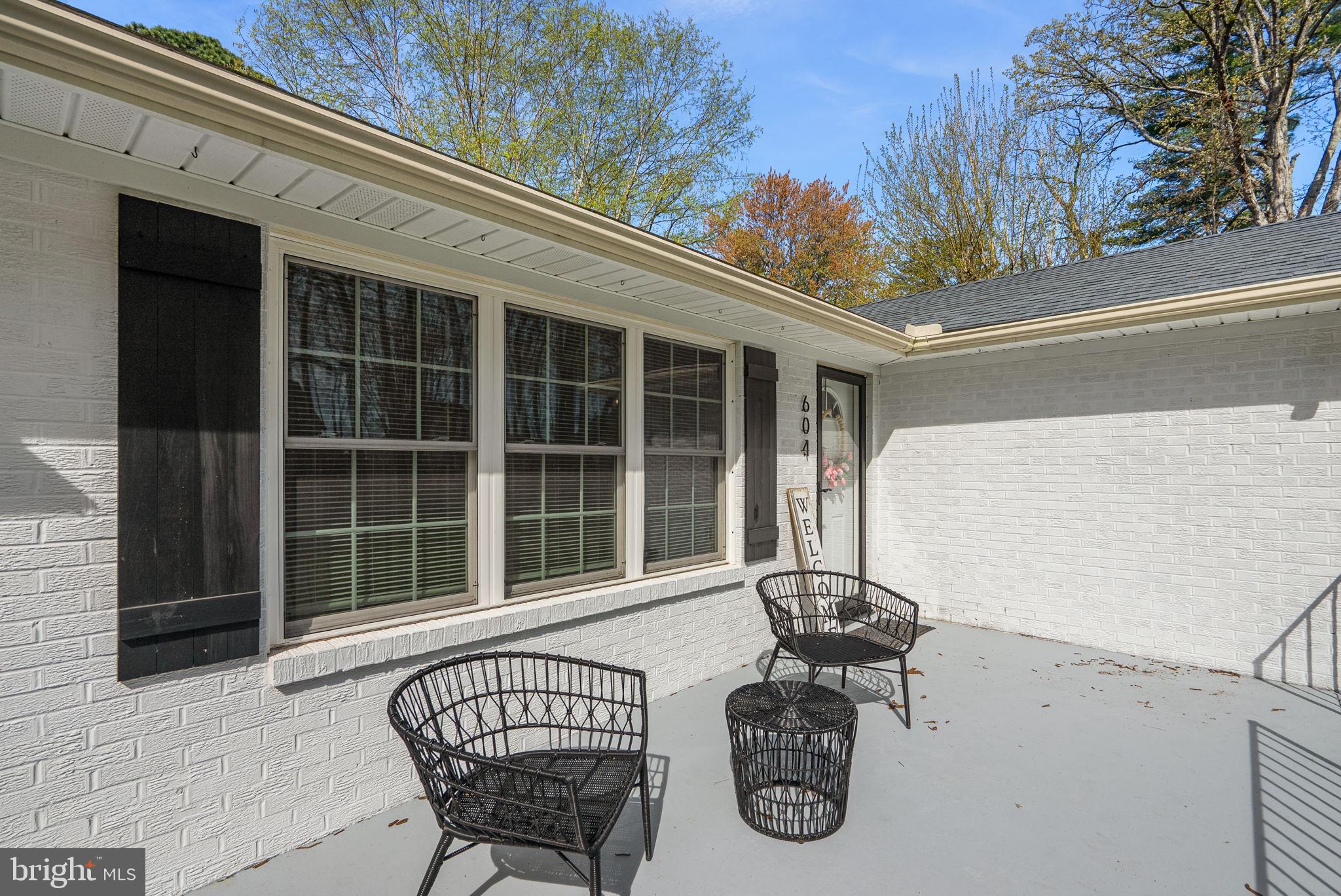 604 Perrys Corner Road Grasonville, MD 21638 - Photo 23 of 32 a view of a chair and table in the balcony