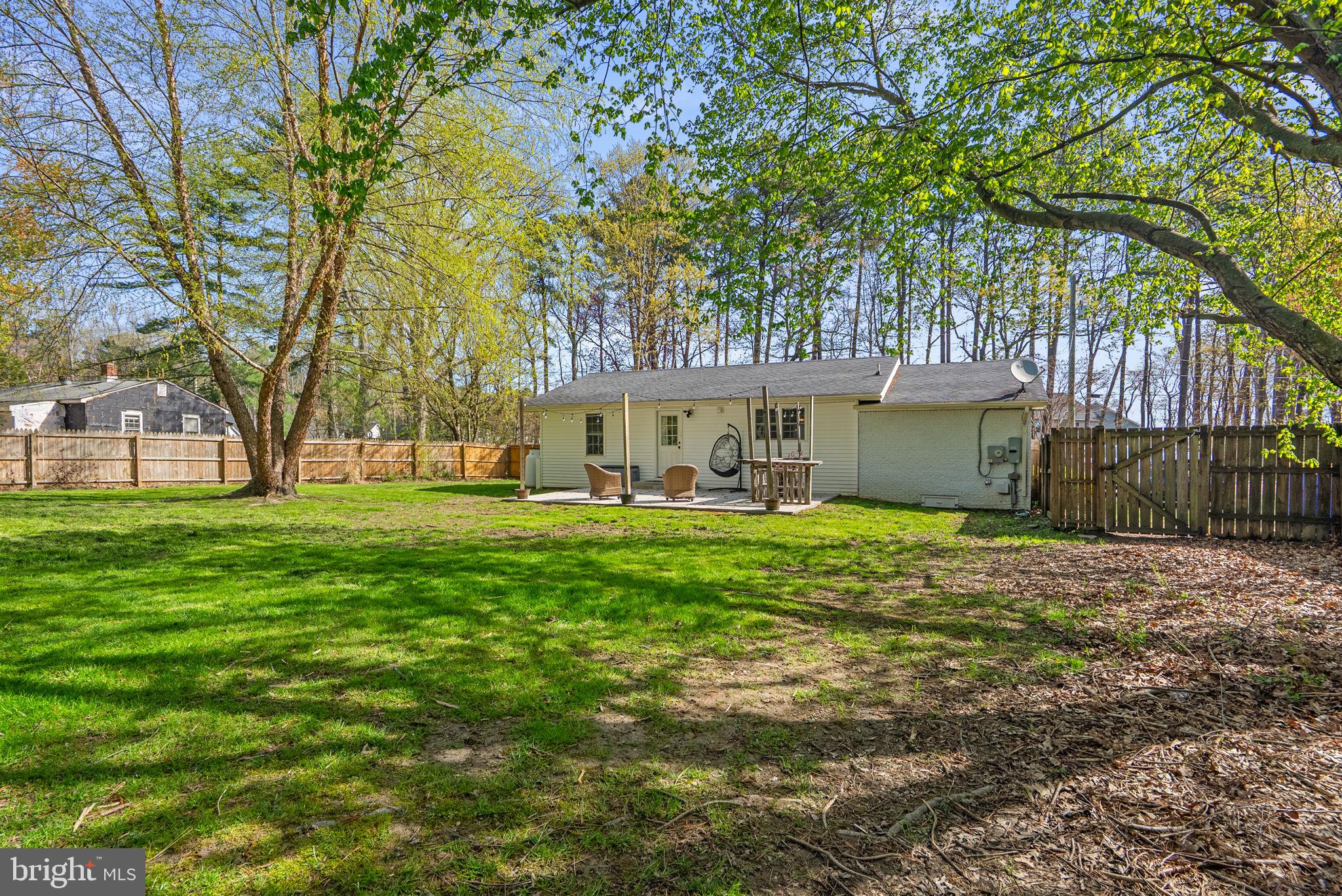 604 Perrys Corner Road Grasonville, MD 21638 - Photo 26 of 32 a view of a house with a yard