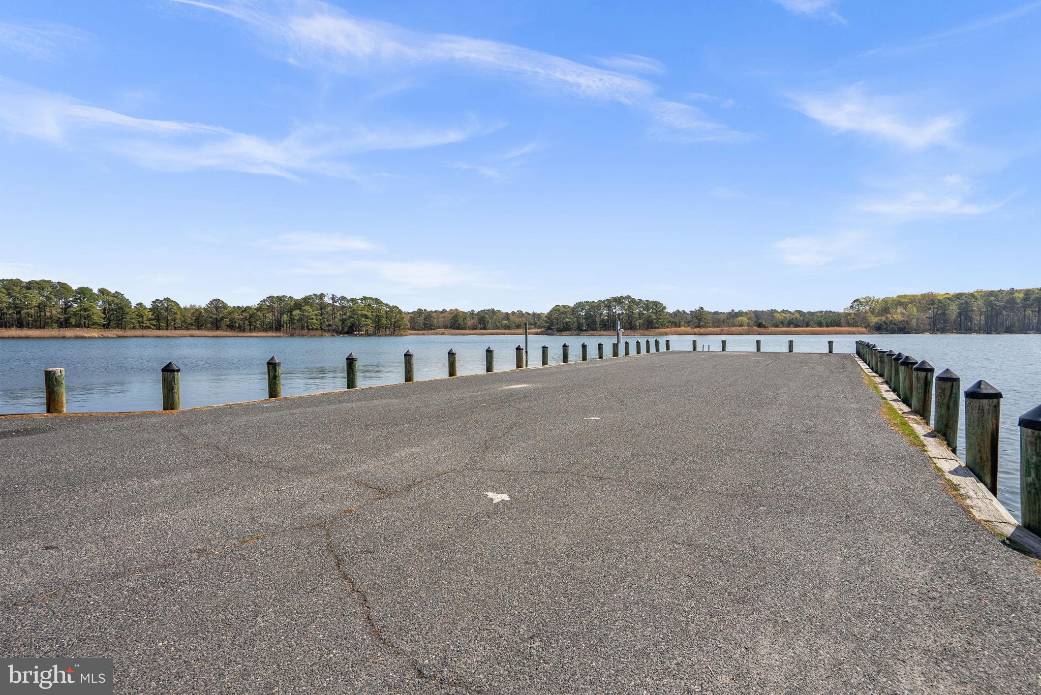 604 Perrys Corner Road Grasonville, MD 21638 - Photo 30 of 32 a view of a house with a ocean view