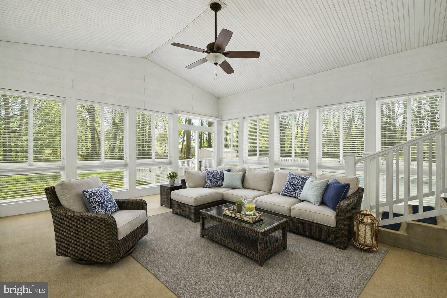 1645 Timber Summit Drive Westminster, MD 21157 - Photo 20 of 65 a living room with furniture and floor to ceiling windows