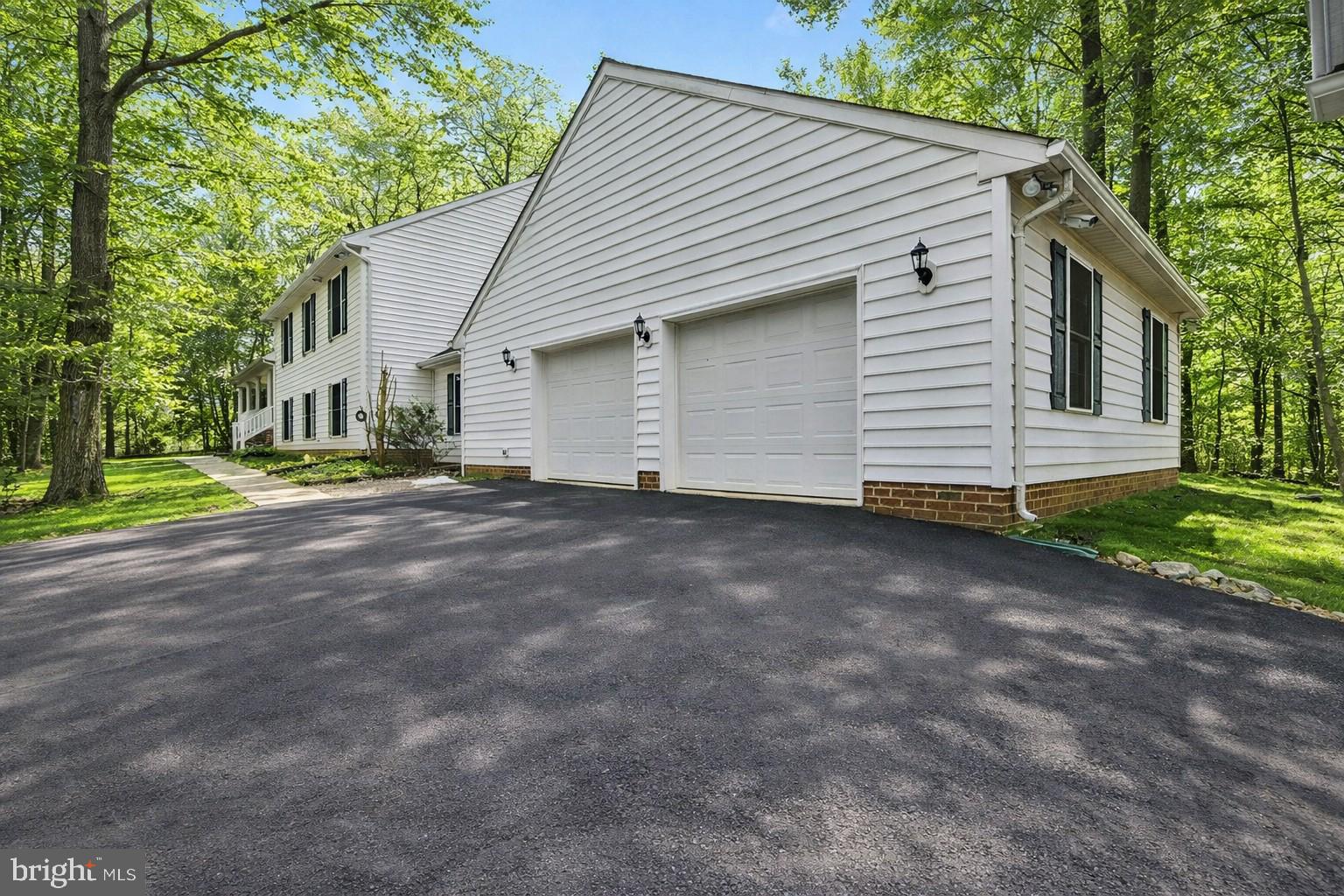 1645 Timber Summit Drive Westminster, MD 21157 - Photo 2 of 65 a view of a house with a yard