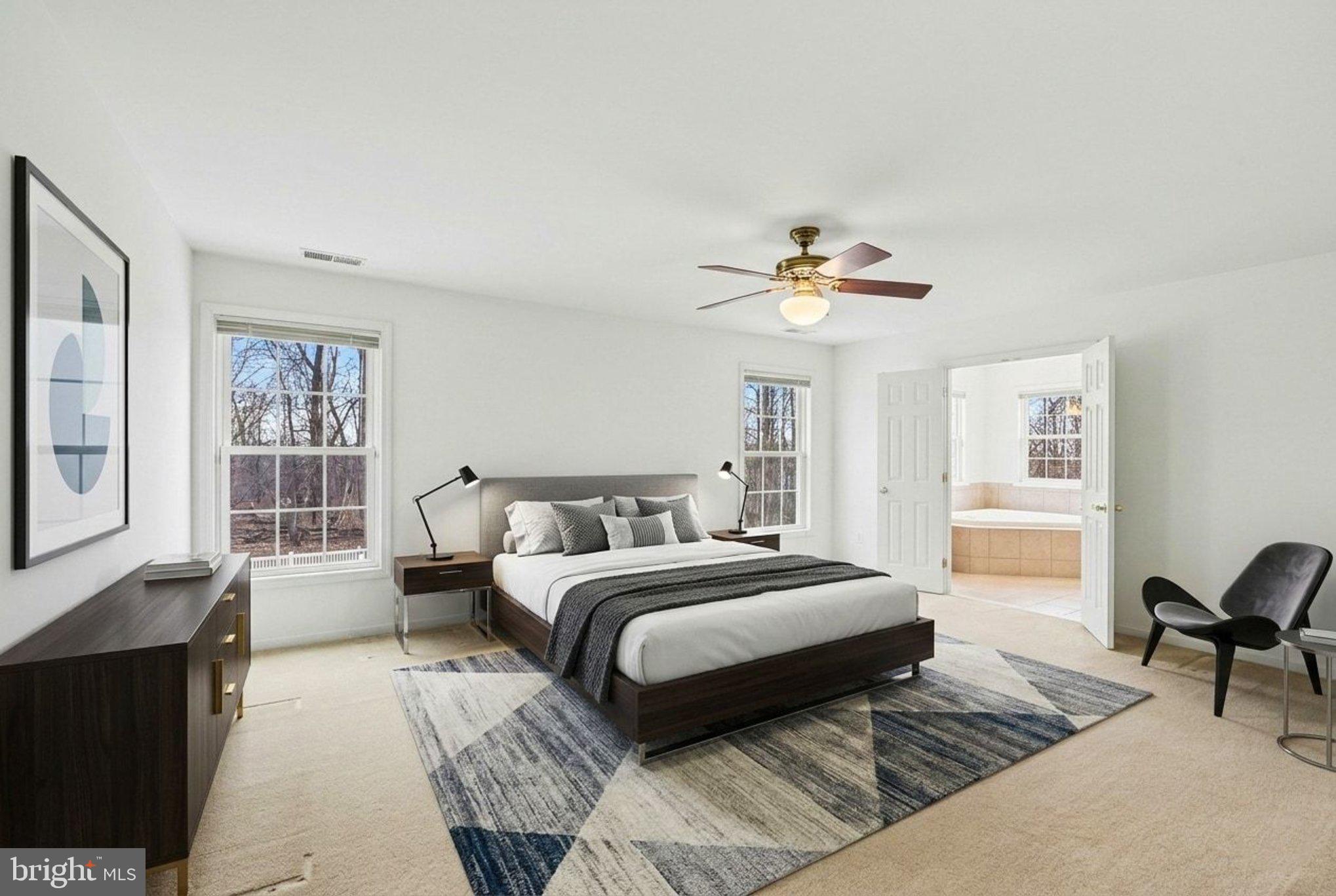 1645 Timber Summit Drive Westminster, MD 21157 - Photo 21 of 65 a bedroom with a large bed and a window