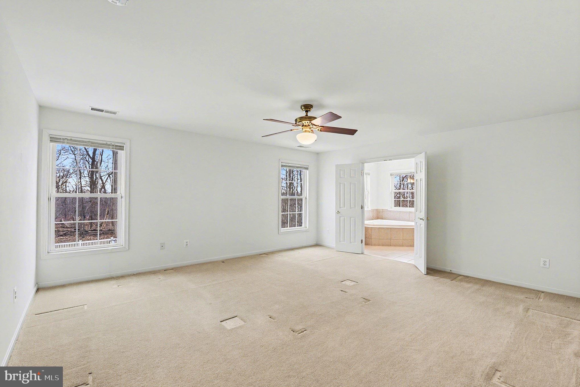 1645 Timber Summit Drive Westminster, MD 21157 - Photo 23 of 65 a view of an empty room with a window