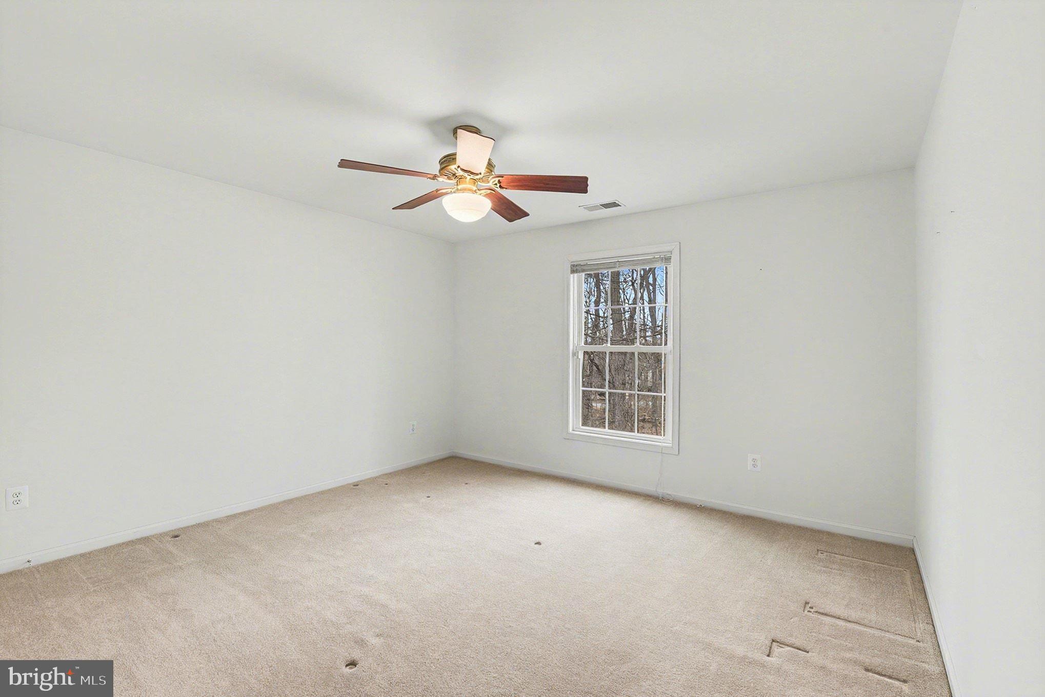 1645 Timber Summit Drive Westminster, MD 21157 - Photo 29 of 65 an empty room with a window