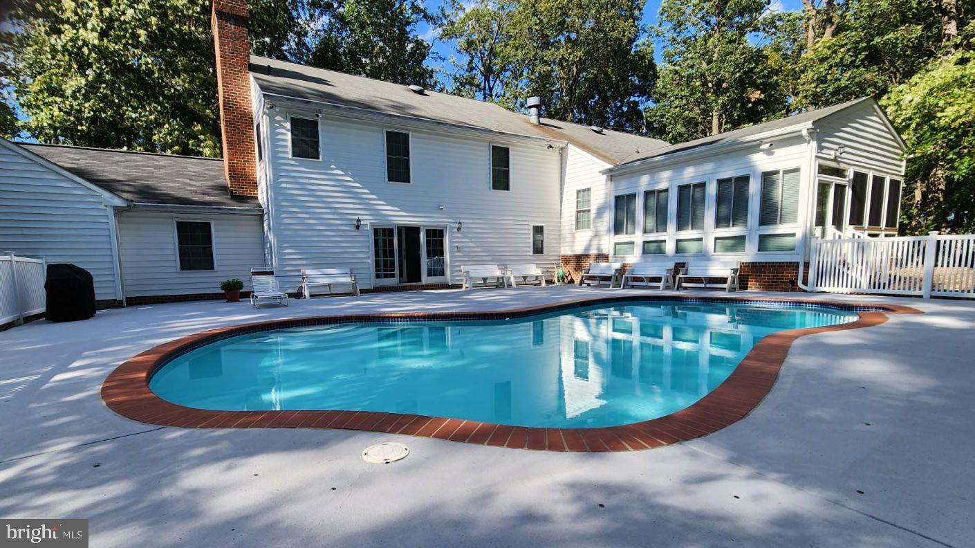 1645 Timber Summit Drive Westminster, MD 21157 - Photo 45 of 65 a view of a house with swimming pool