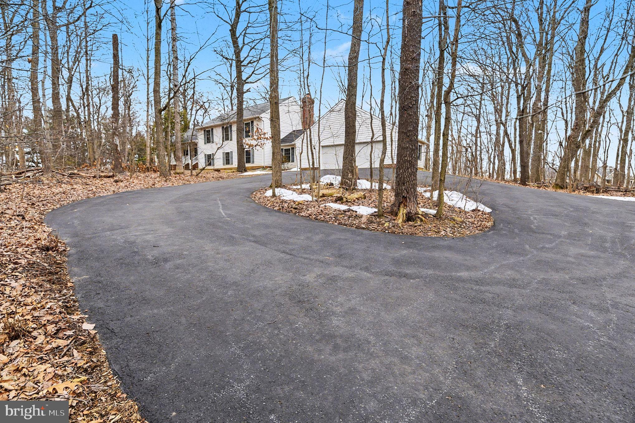 1645 Timber Summit Drive Westminster, MD 21157 - Photo 52 of 65 a view of a tall white building