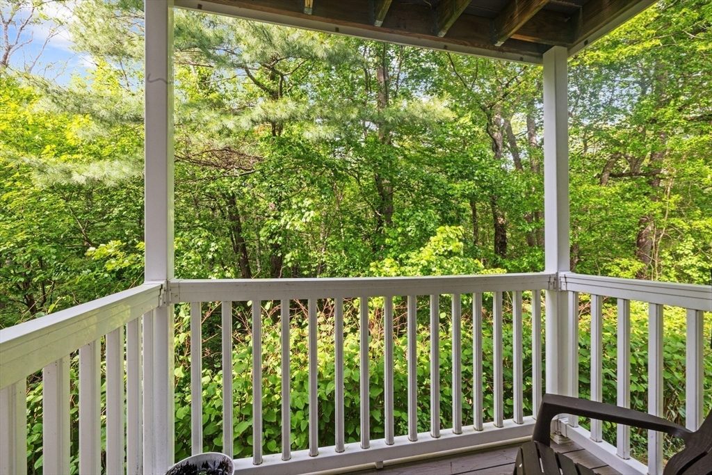1619 Braley Road, Unit 97 New Bedford, MA 02745 - Photo 21 of 27 a view of a wooden deck