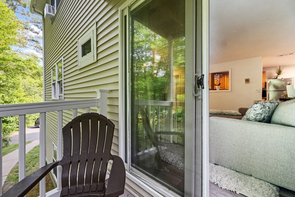 1619 Braley Road, Unit 97 New Bedford, MA 02745 - Photo 22 of 27 a view of a balcony with furniture