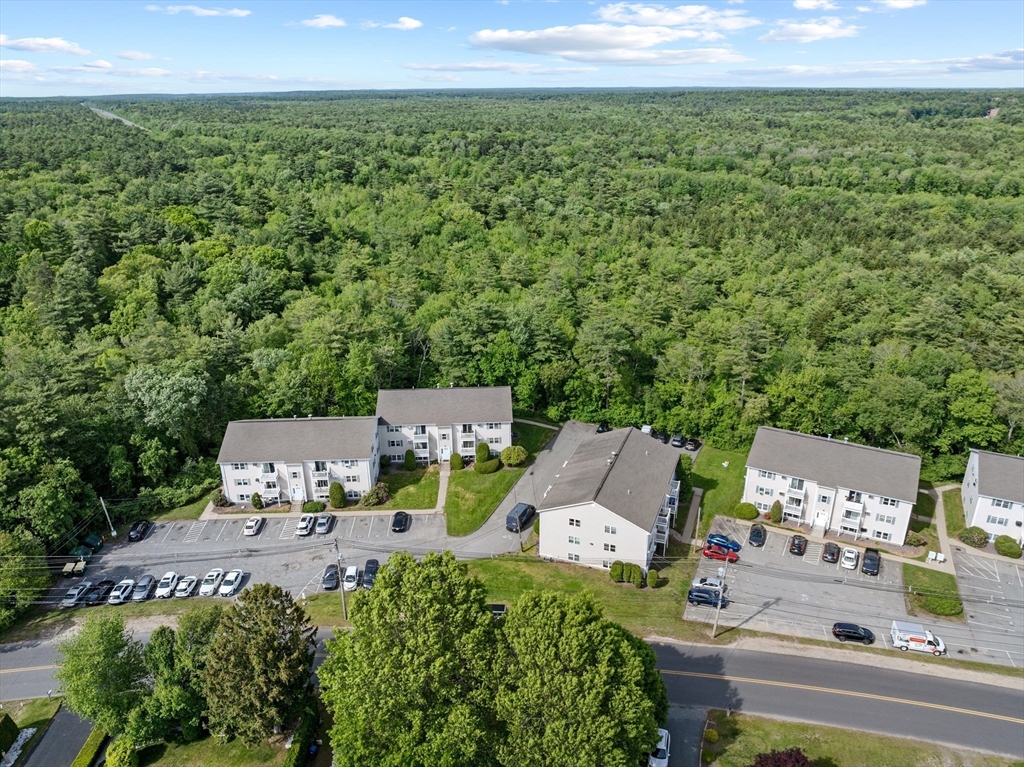 1619 Braley Road, Unit 97 New Bedford, MA 02745 - Photo 25 of 27 a view of a terrace with sitting area
