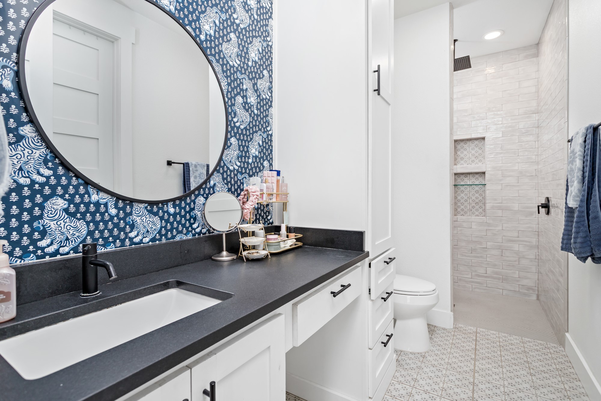 10573 Cooks Lake Road Lumberton, TX 77657 - Photo 23 of 47 a bathroom with a sink a toilet and a mirror