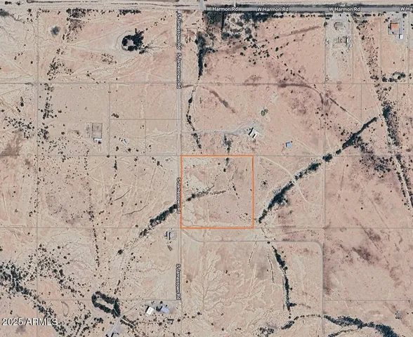 a view of a road with a building in the background