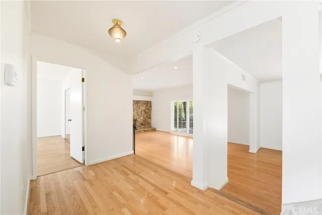 a view of a livingroom with wooden floor