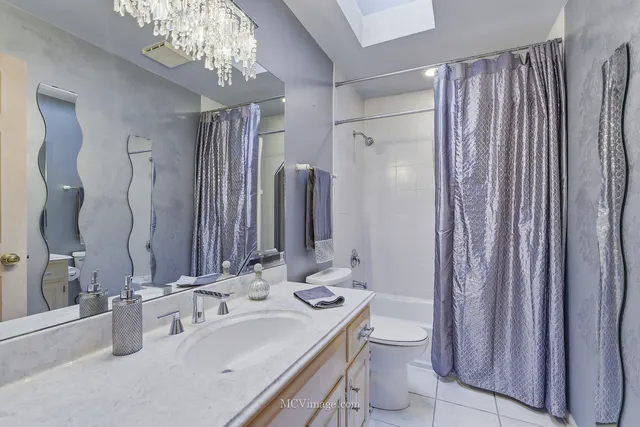 a utility room with a sink a washer and dryer