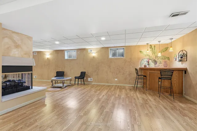 a bedroom with bed and a window