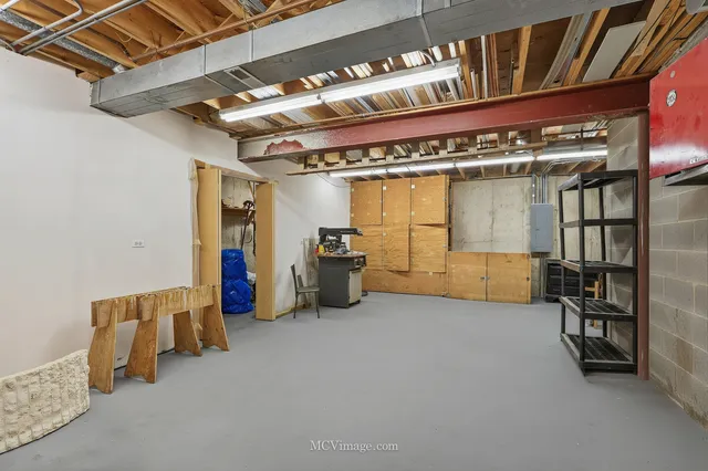 a view of a patio with table and chairs and potted plants