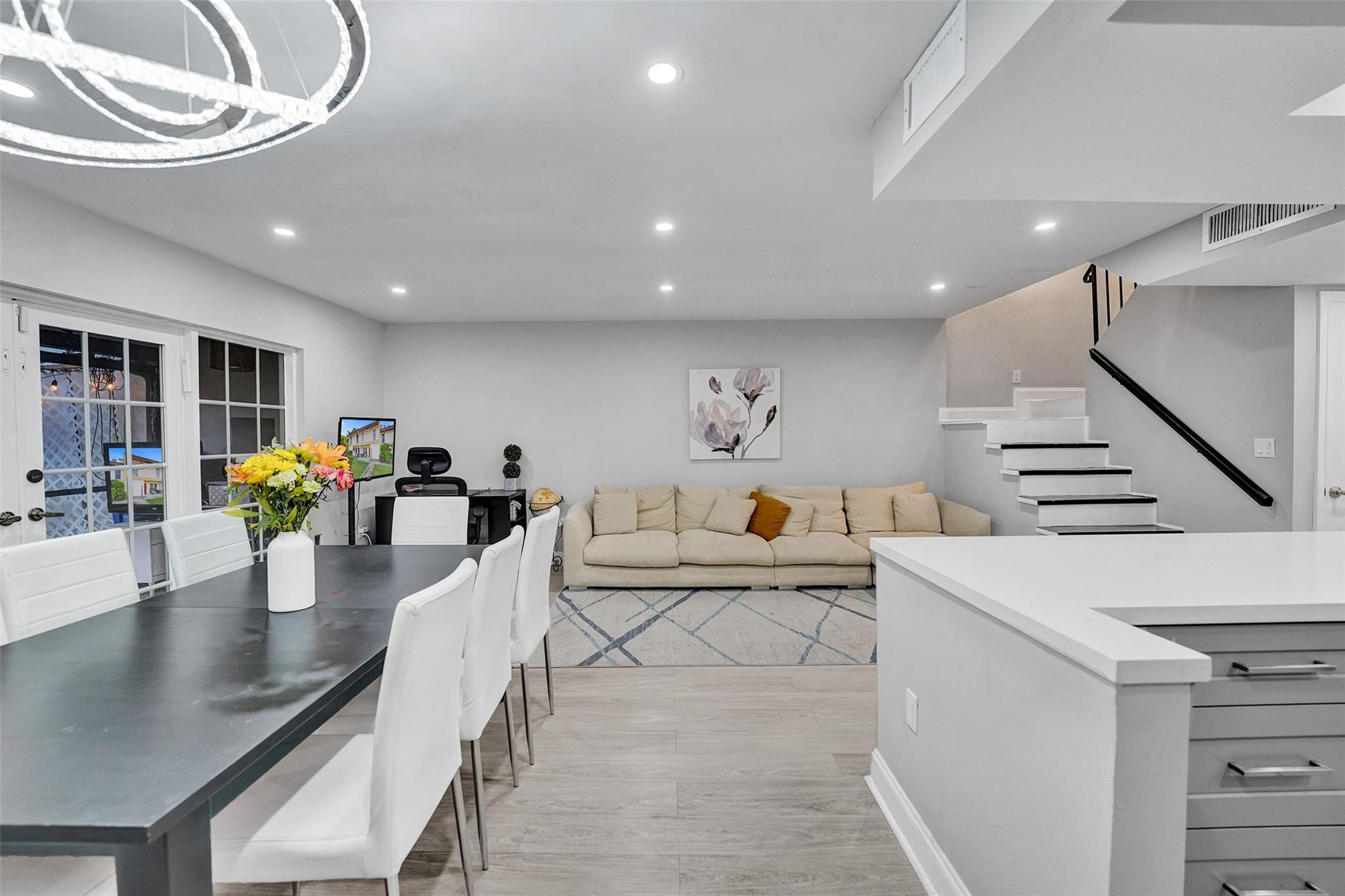 3301 Raleigh Street, Unit 4B Hollywood, FL 33021 - Photo 19 of 54 a living room with furniture and wooden floor