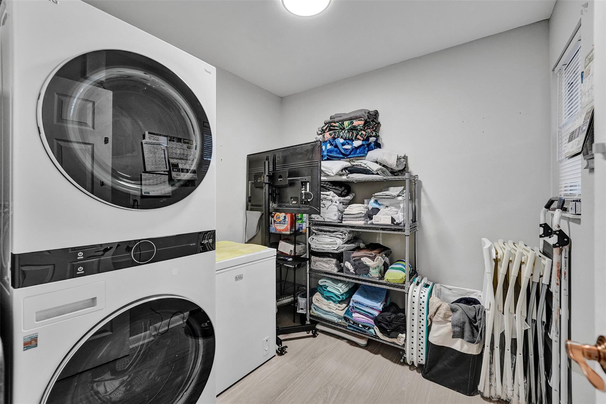 3301 Raleigh Street, Unit 4B Hollywood, FL 33021 - Photo 22 of 54 a view of a storage & utility room with washer and dryer