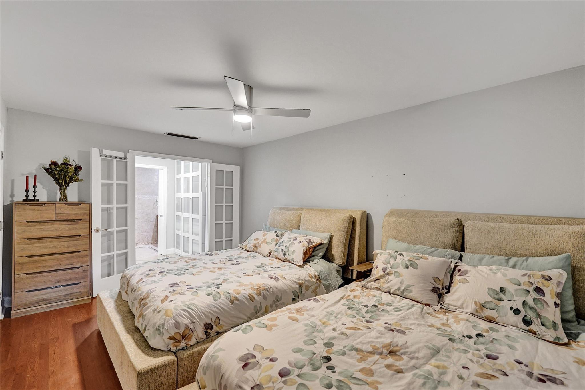 3301 Raleigh Street, Unit 4B Hollywood, FL 33021 - Photo 42 of 54 a bedroom with two beds and a dresser