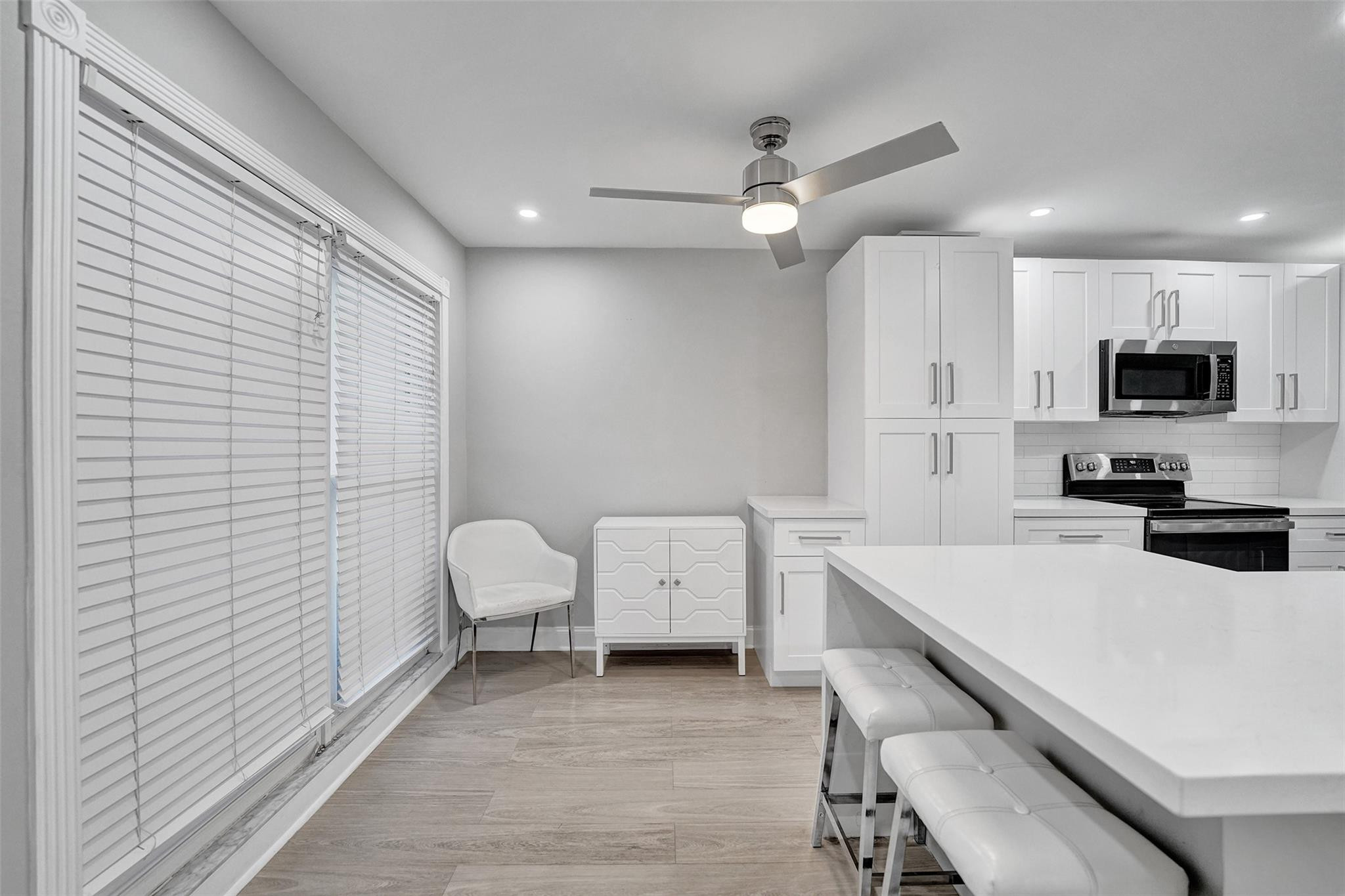 3301 Raleigh Street, Unit 4B Hollywood, FL 33021 - Photo 6 of 54 a kitchen with a sink cabinets and wooden floor