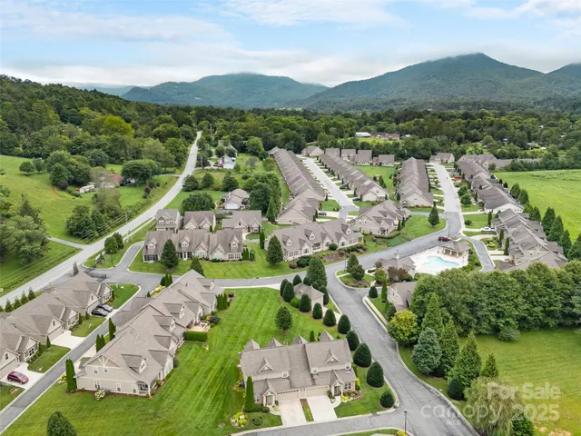 a view of outdoor space with sign board and garden