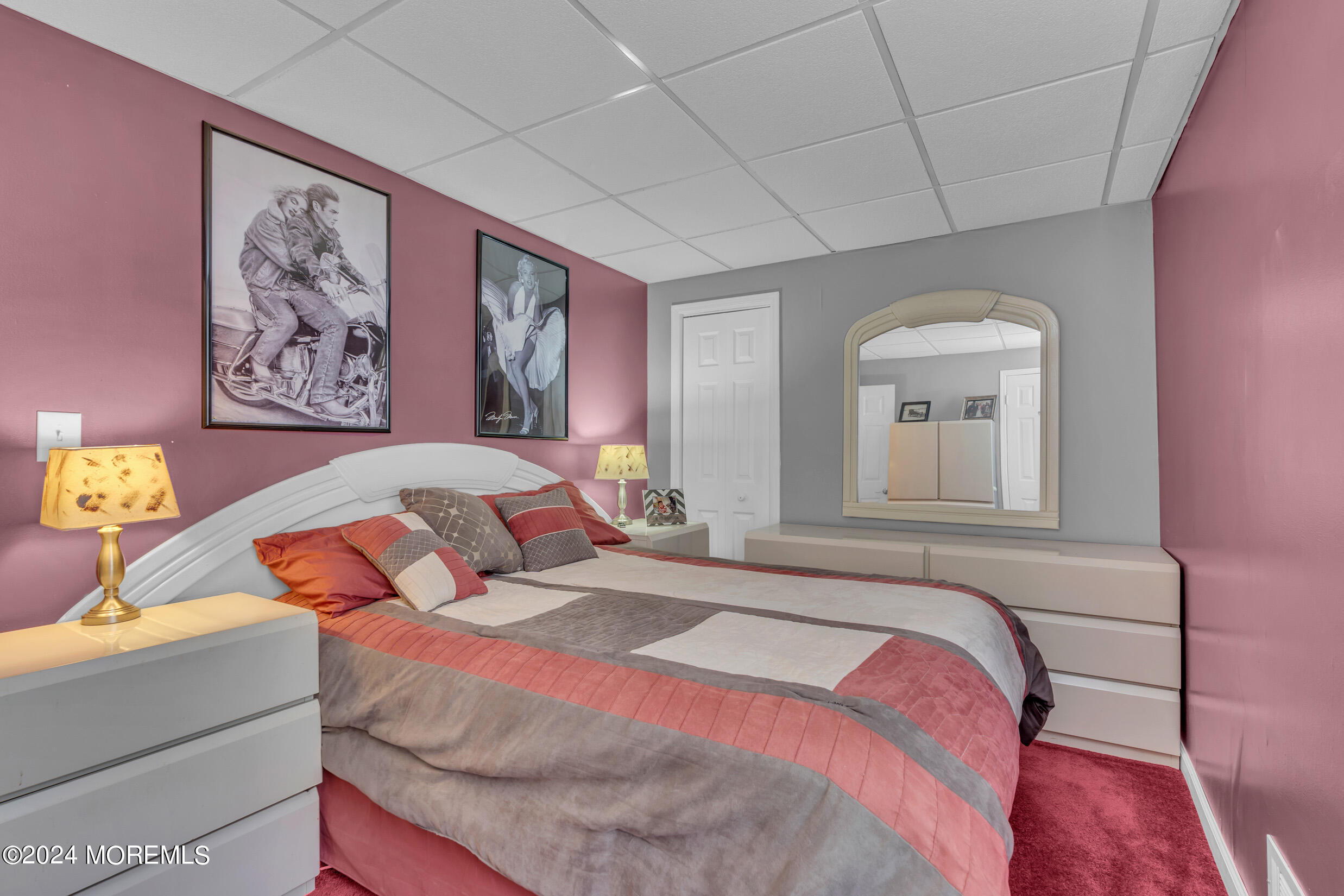 1126 Toms River Road Jackson, NJ 08527 - Photo 11 of 38 a bedroom with a bed and a painting on the wall