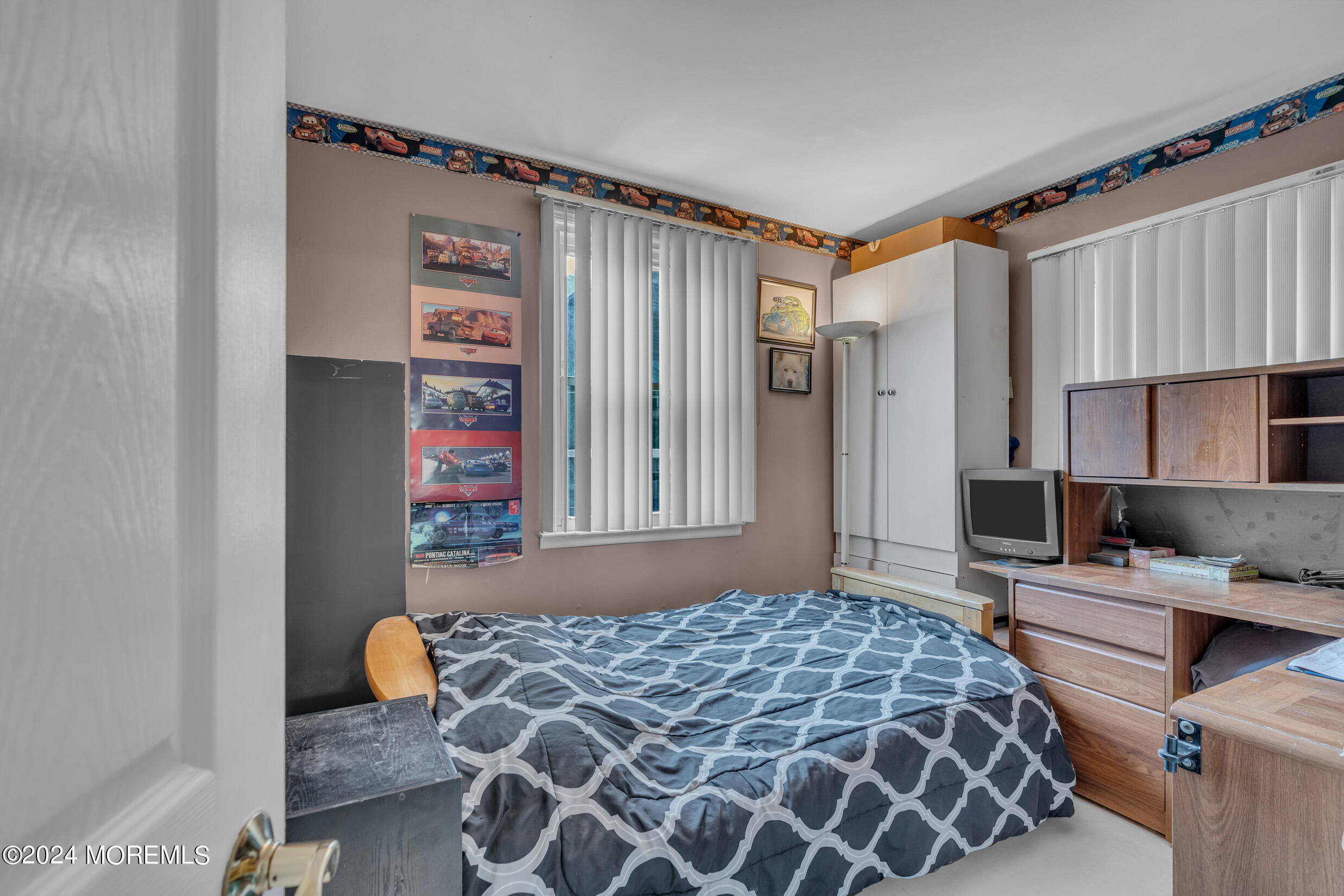 1126 Toms River Road Jackson, NJ 08527 - Photo 12 of 38 a bedroom with a bed and a window