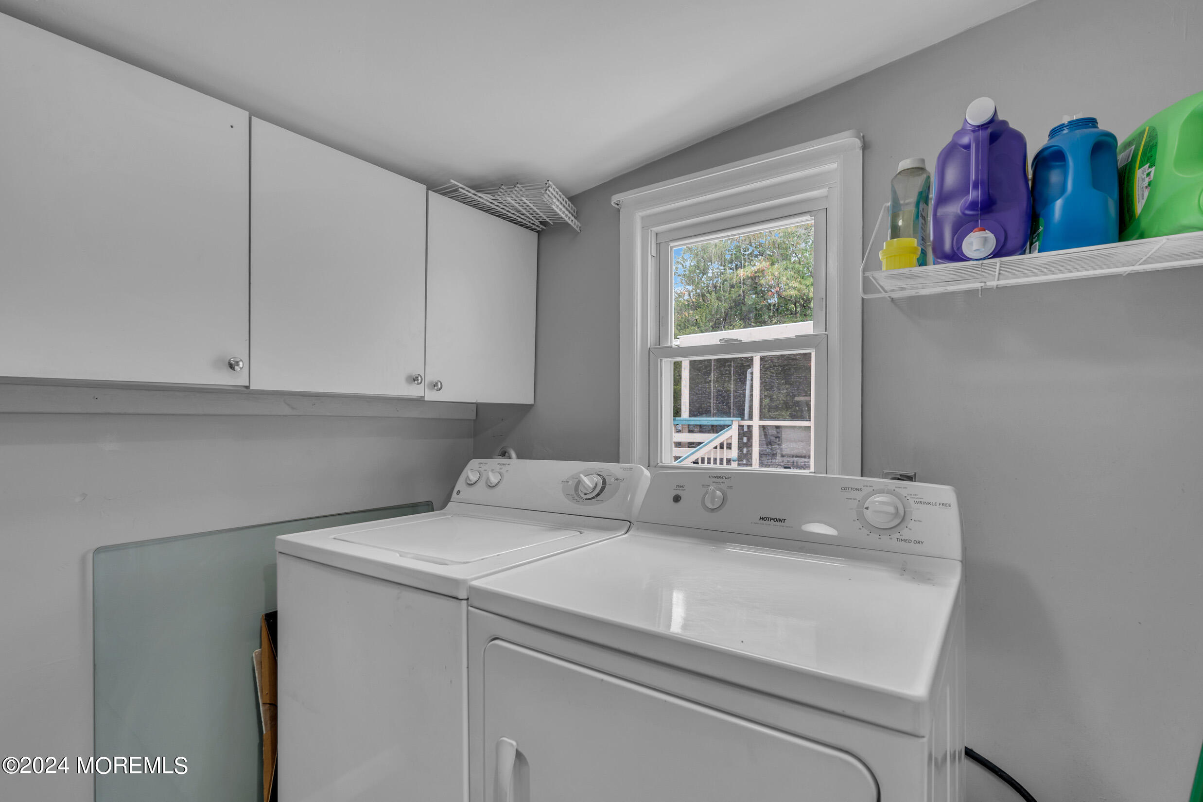 1126 Toms River Road Jackson, NJ 08527 - Photo 15 of 38 a utility room with dryer washer and a window