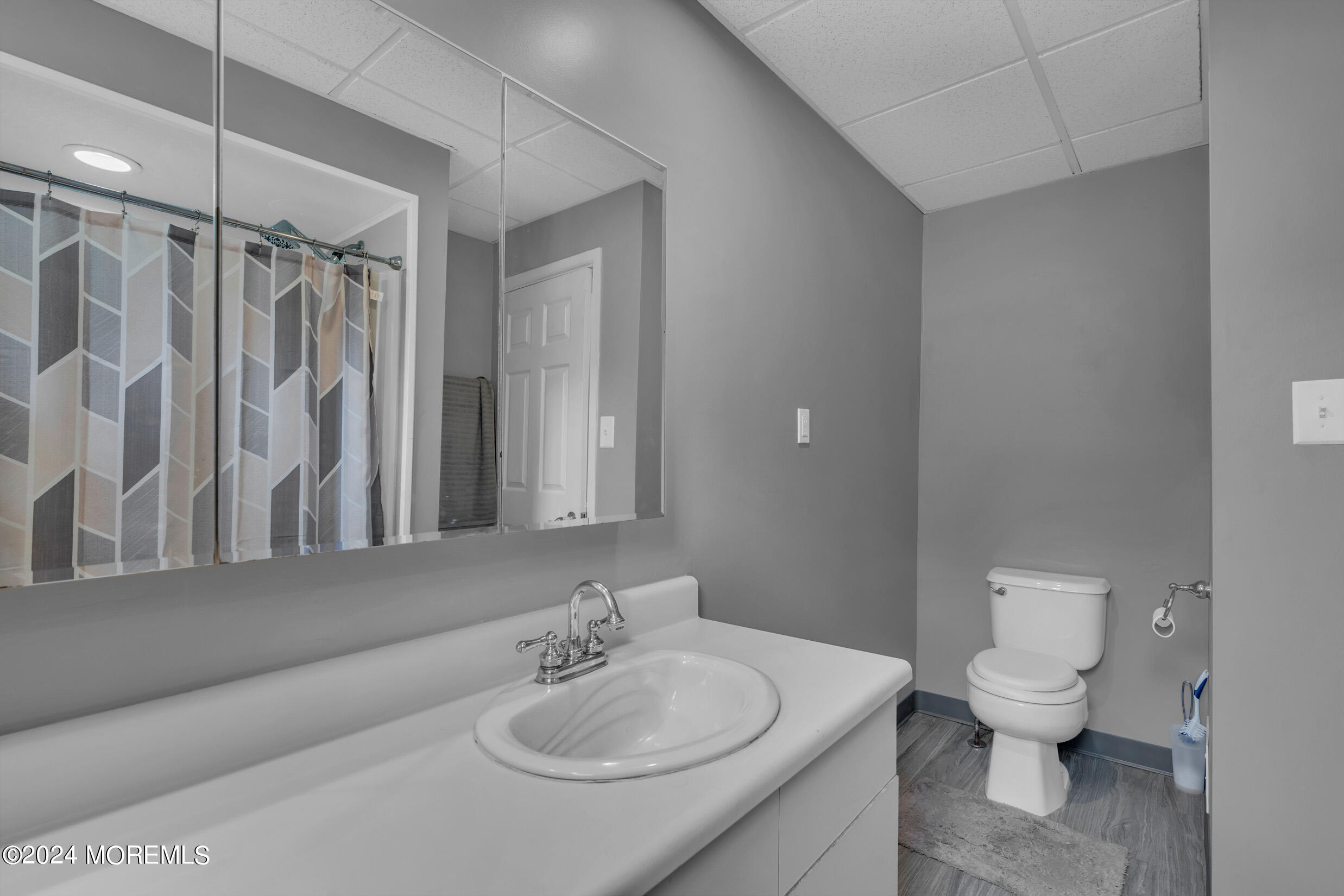 1126 Toms River Road Jackson, NJ 08527 - Photo 17 of 38 a bathroom with a sink toilet and shower