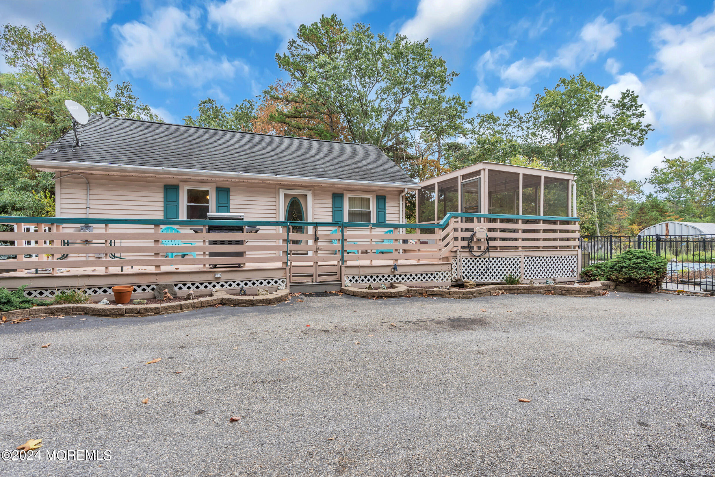 1126 Toms River Road Jackson, NJ 08527 - Photo 23 of 38 front view of a house with a street