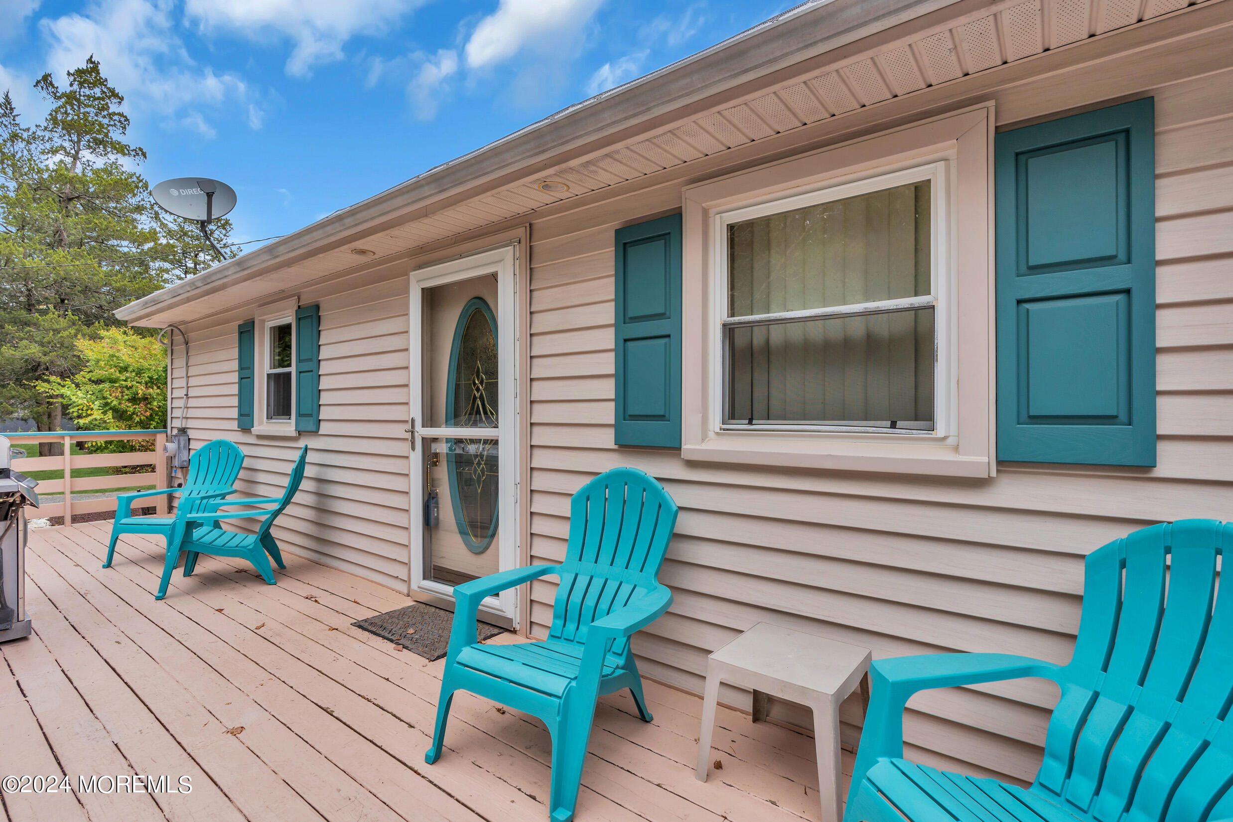 1126 Toms River Road Jackson, NJ 08527 - Photo 24 of 38 a view of a chair and table in back of the house