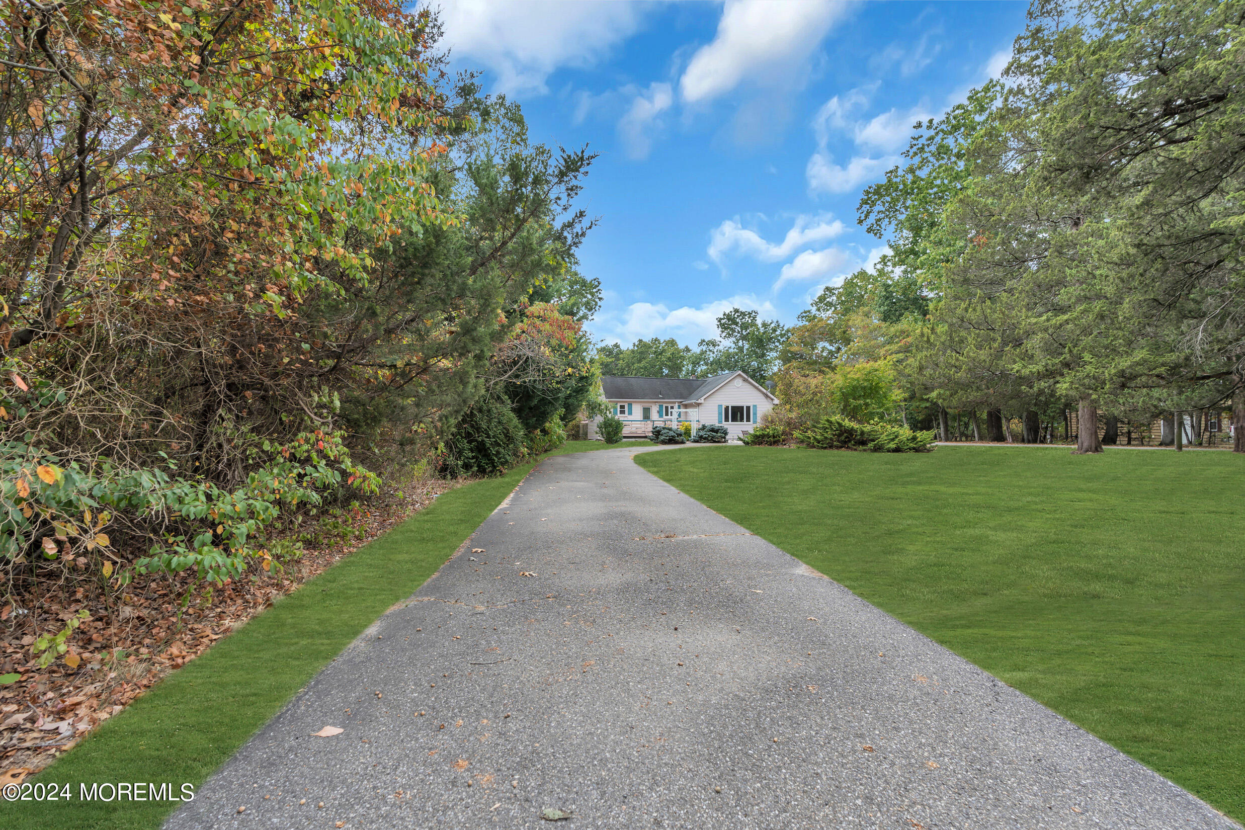 1126 Toms River Road Jackson, NJ 08527 - Photo 3 of 38 a view of a grassy field with trees