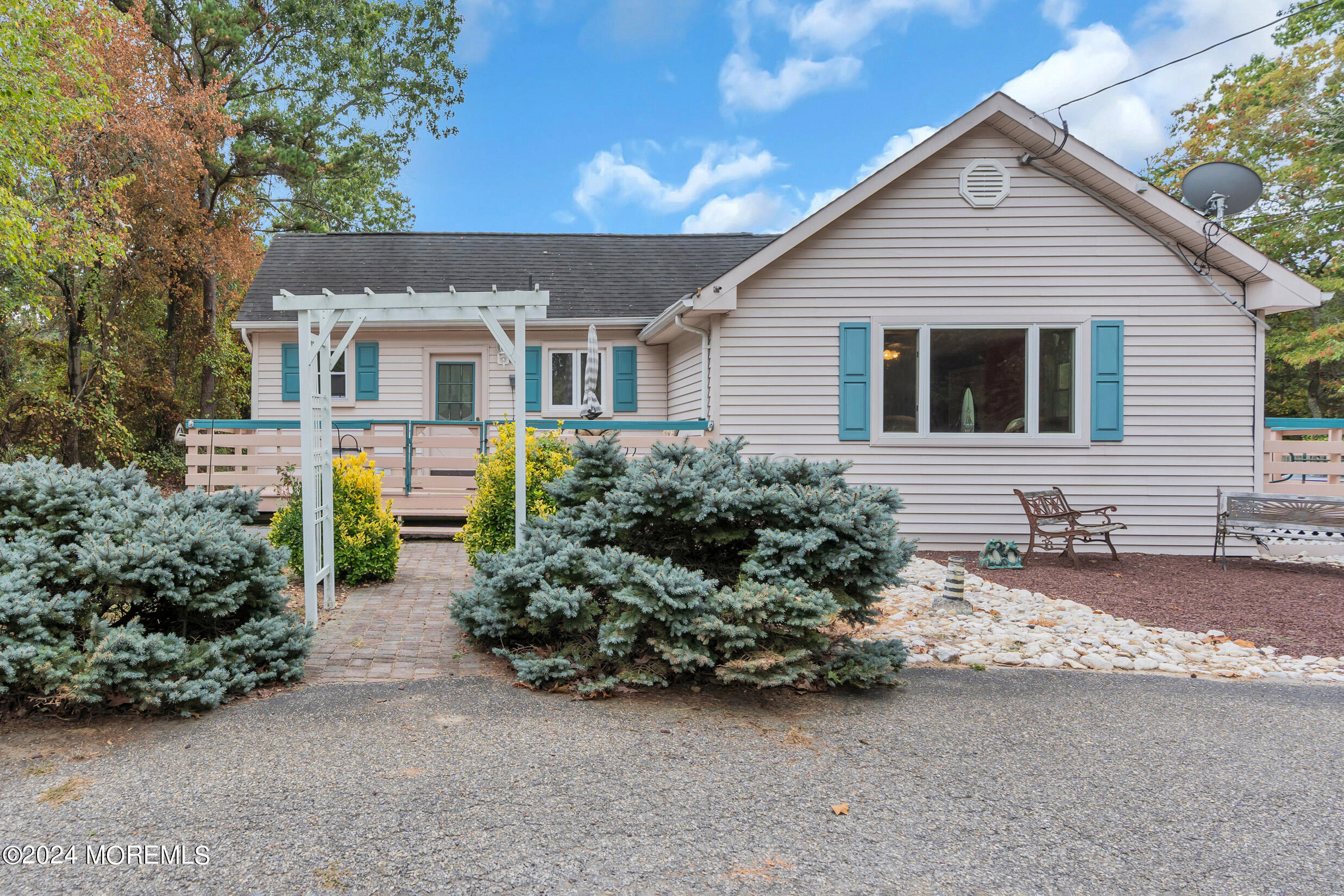 1126 Toms River Road Jackson, NJ 08527 - Photo 35 of 38 a front view of a house with garden
