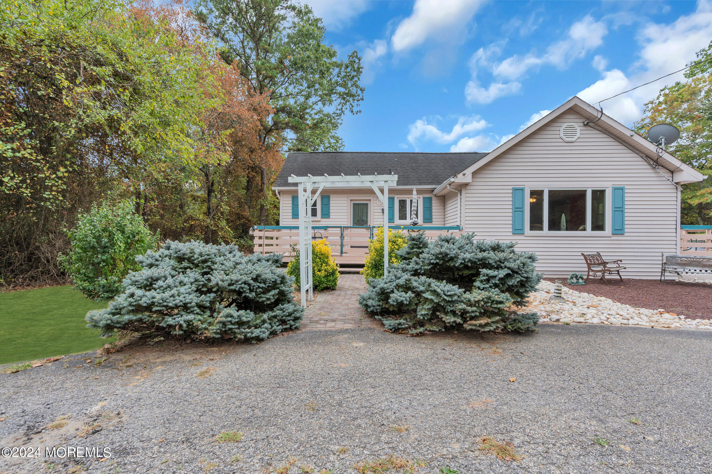 1126 Toms River Road Jackson, NJ 08527 - Photo 36 of 38 a front view of a house with a yard