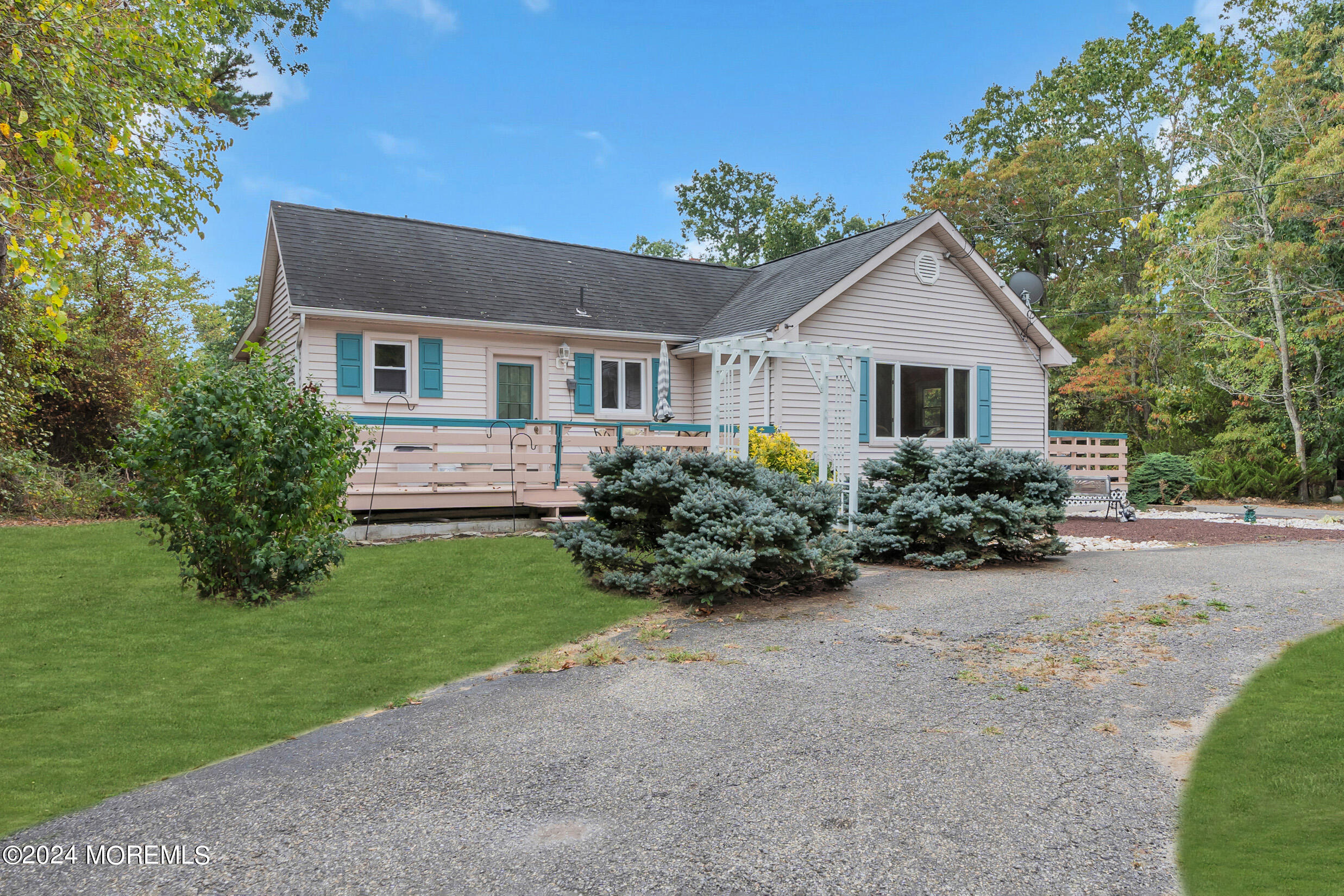 1126 Toms River Road Jackson, NJ 08527 - Photo 37 of 38 a front view of a house with a yard