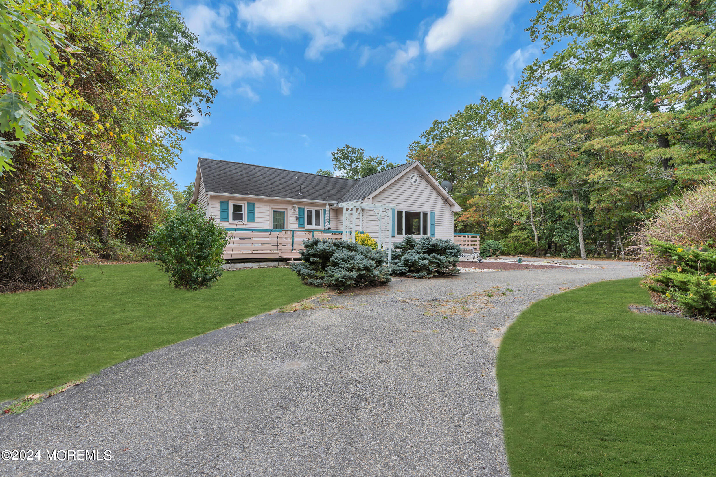 1126 Toms River Road Jackson, NJ 08527 - Photo 38 of 38 a front view of a house with a yard