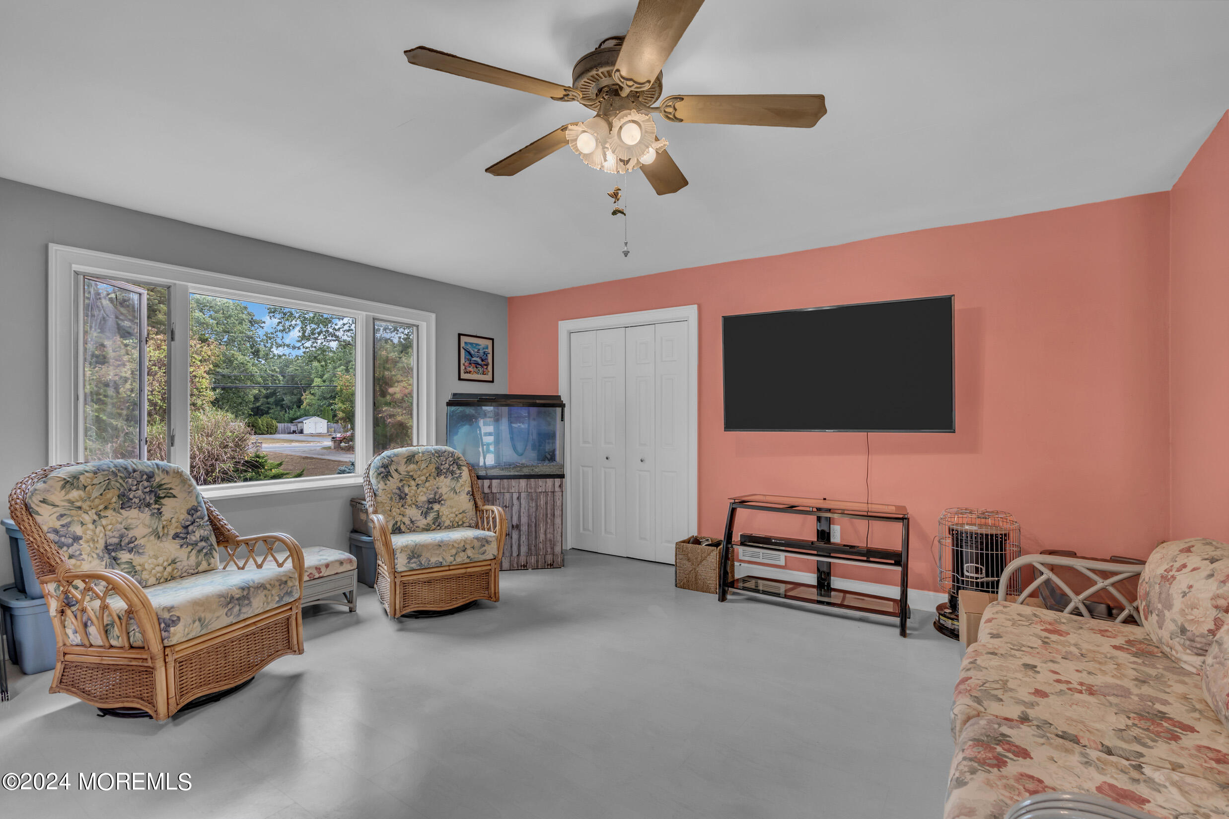 1126 Toms River Road Jackson, NJ 08527 - Photo 8 of 38 a living room with furniture and a flat screen tv