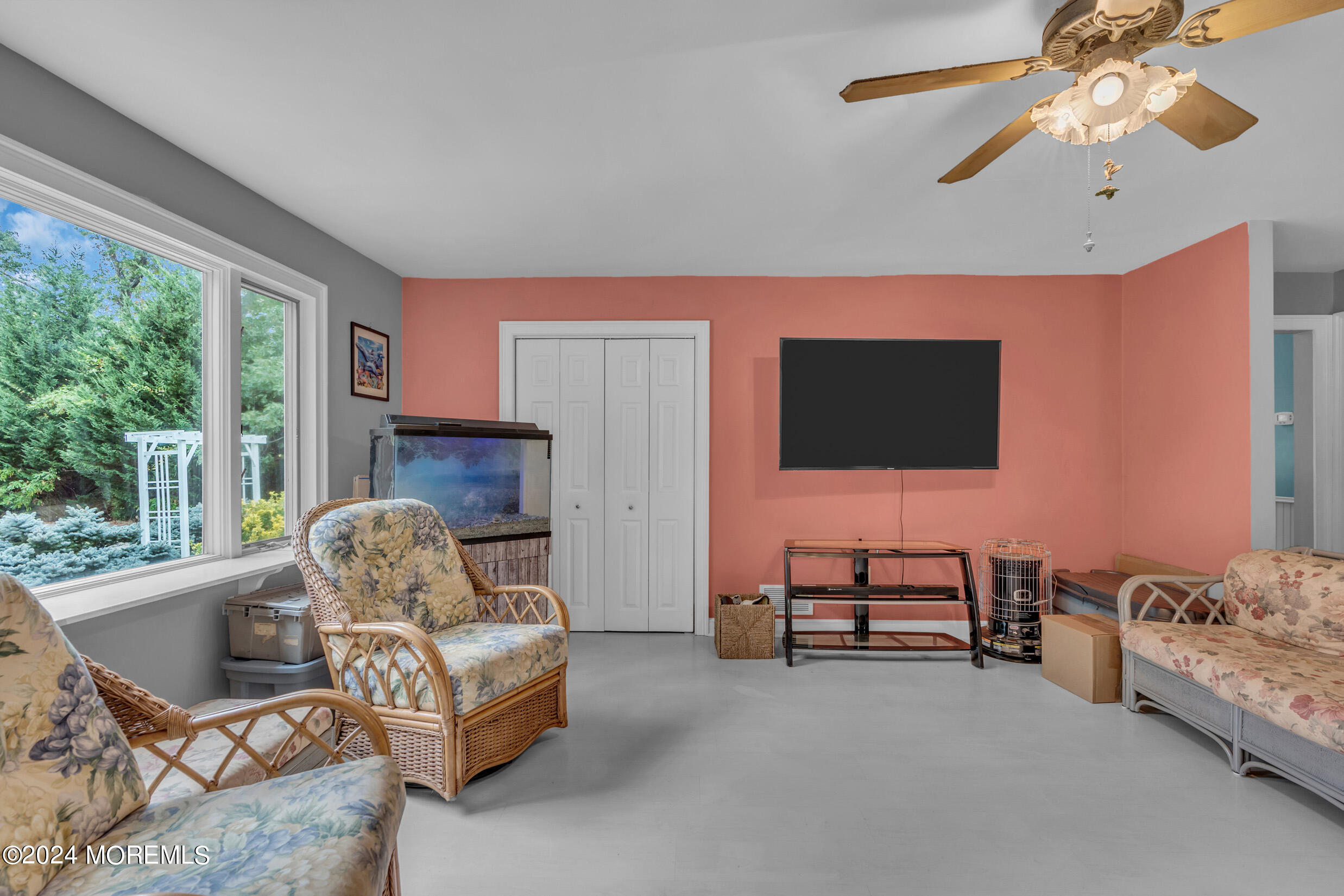 1126 Toms River Road Jackson, NJ 08527 - Photo 9 of 38 a living room with furniture and a flat screen tv