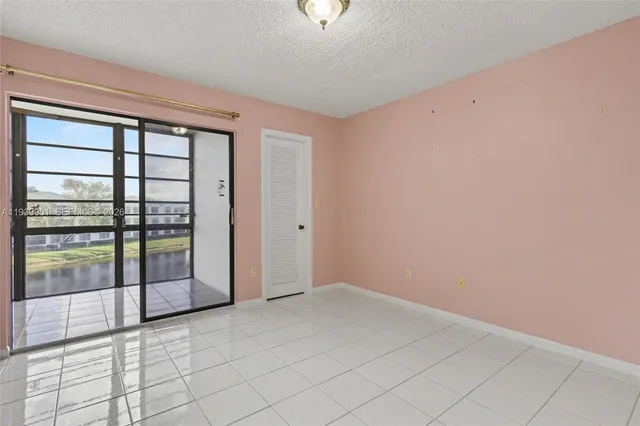 a view of an empty room with window