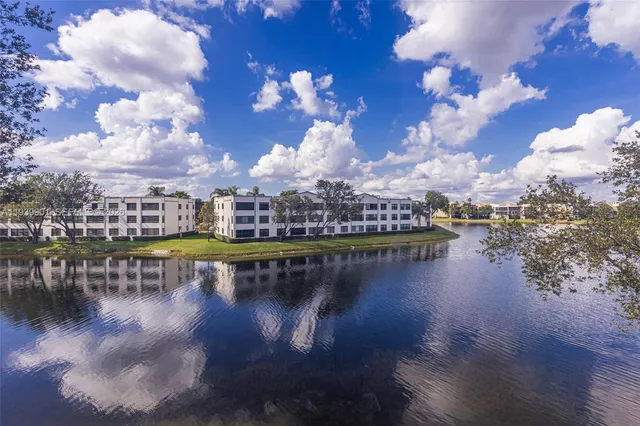 a view of swimming pool with outdoor seating
