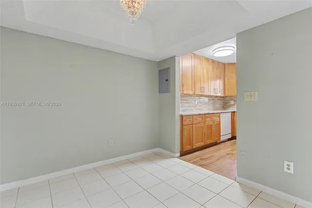 a view of a kitchen with a sink