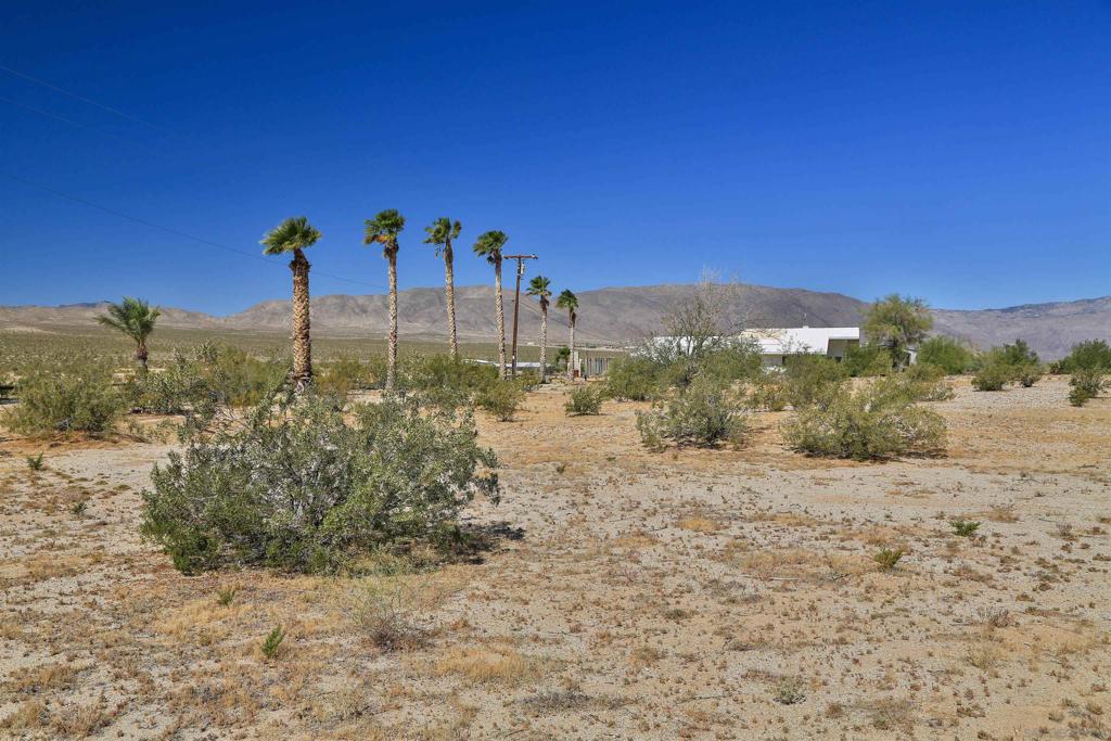2772 Stinson Road Borrego Springs, CA 92004 - Photo 8 of 13 a view of a road with a building in the background