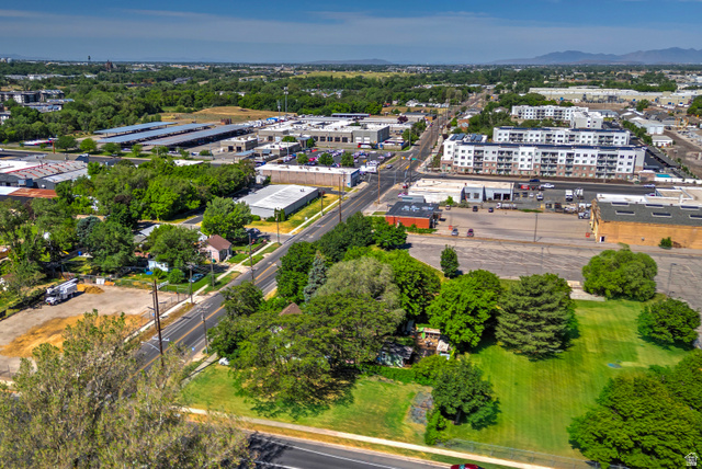 178 17th Street Ogden, UT 84404 - Photo 6 of 29 Aerial perspective showcasing a mixed-use neighborhood with residential and commercial properties