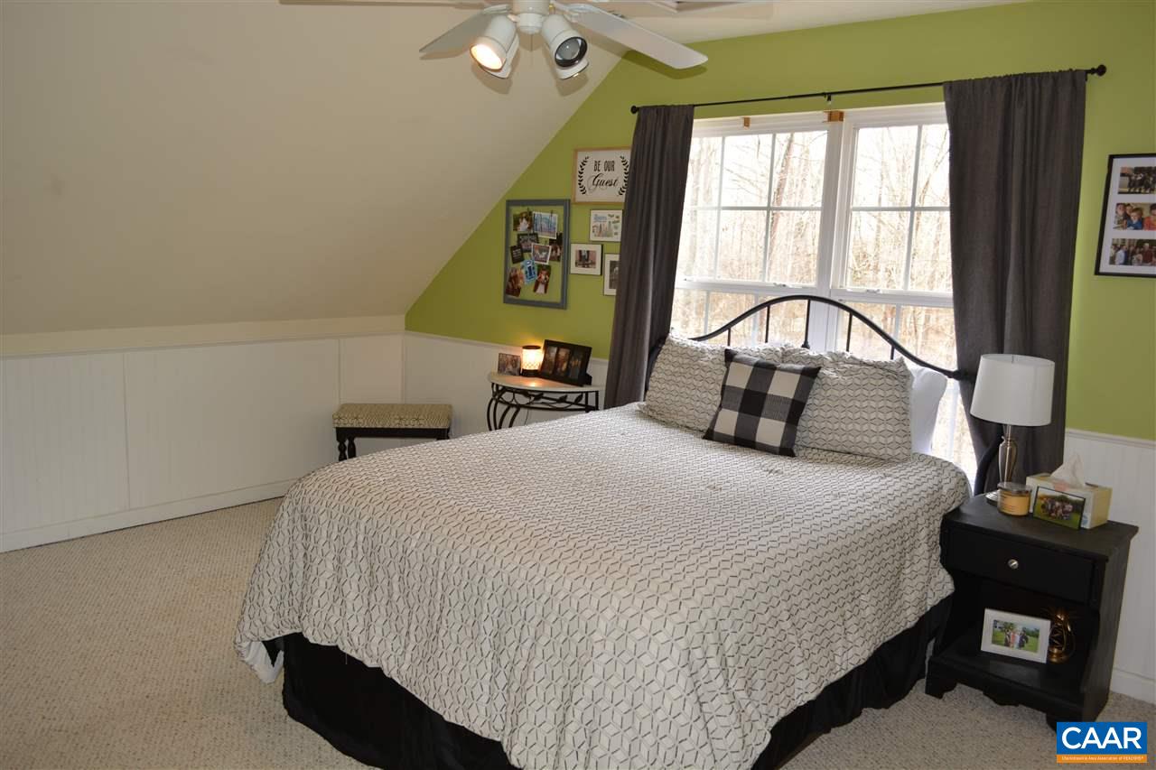 1 Riverside Drive Palmyra, VA 22963 - Photo 16 of 26 a bedroom with a bed and a window