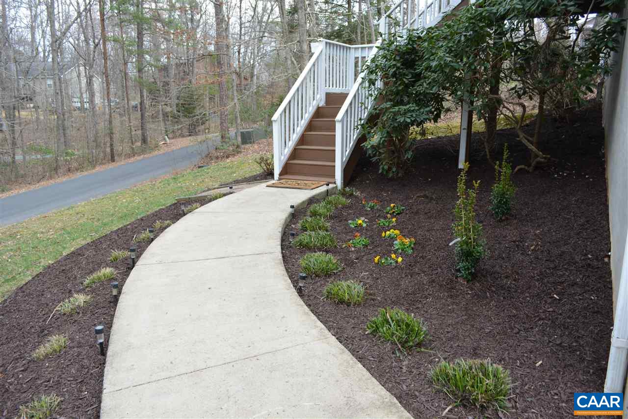 1 Riverside Drive Palmyra, VA 22963 - Photo 2 of 26 a view of a garden with large trees
