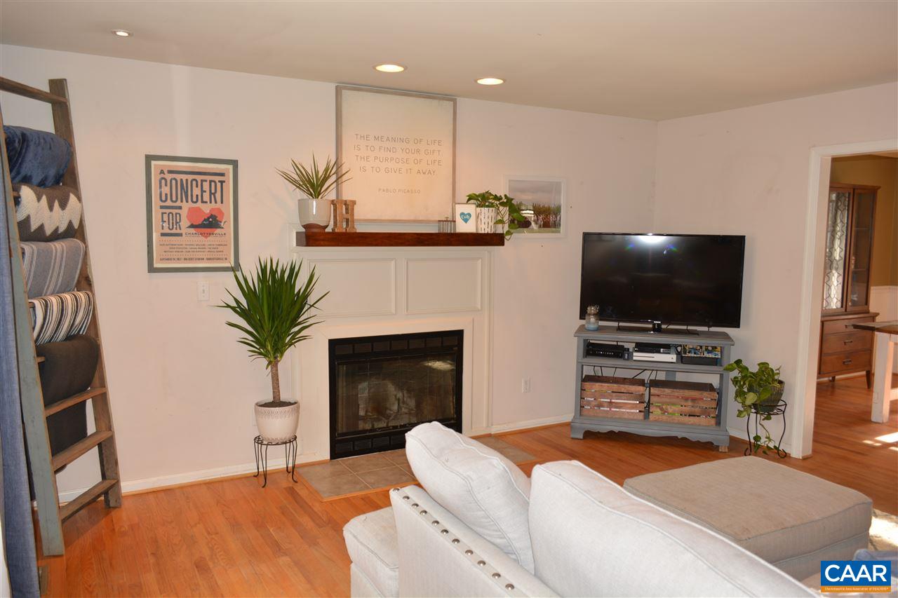 1 Riverside Drive Palmyra, VA 22963 - Photo 7 of 26 a living room with furniture and a flat screen tv